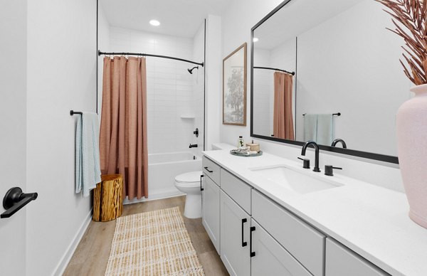 Elegant bathroom with modern fixtures at Elan Prosperity Village Apartments