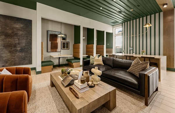 Clubhouse with modern furnishings at Elan Prosperity Village Apartments, perfect for social gatherings and relaxation