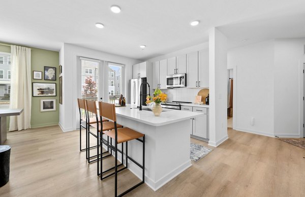 Elegant dining area with modern decor in Elan Prosperity Village Apartments