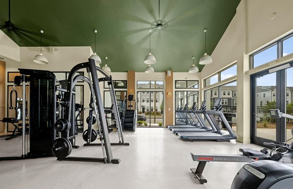 Modern fitness center with state-of-the-art equipment at Elan Prosperity Village Apartments