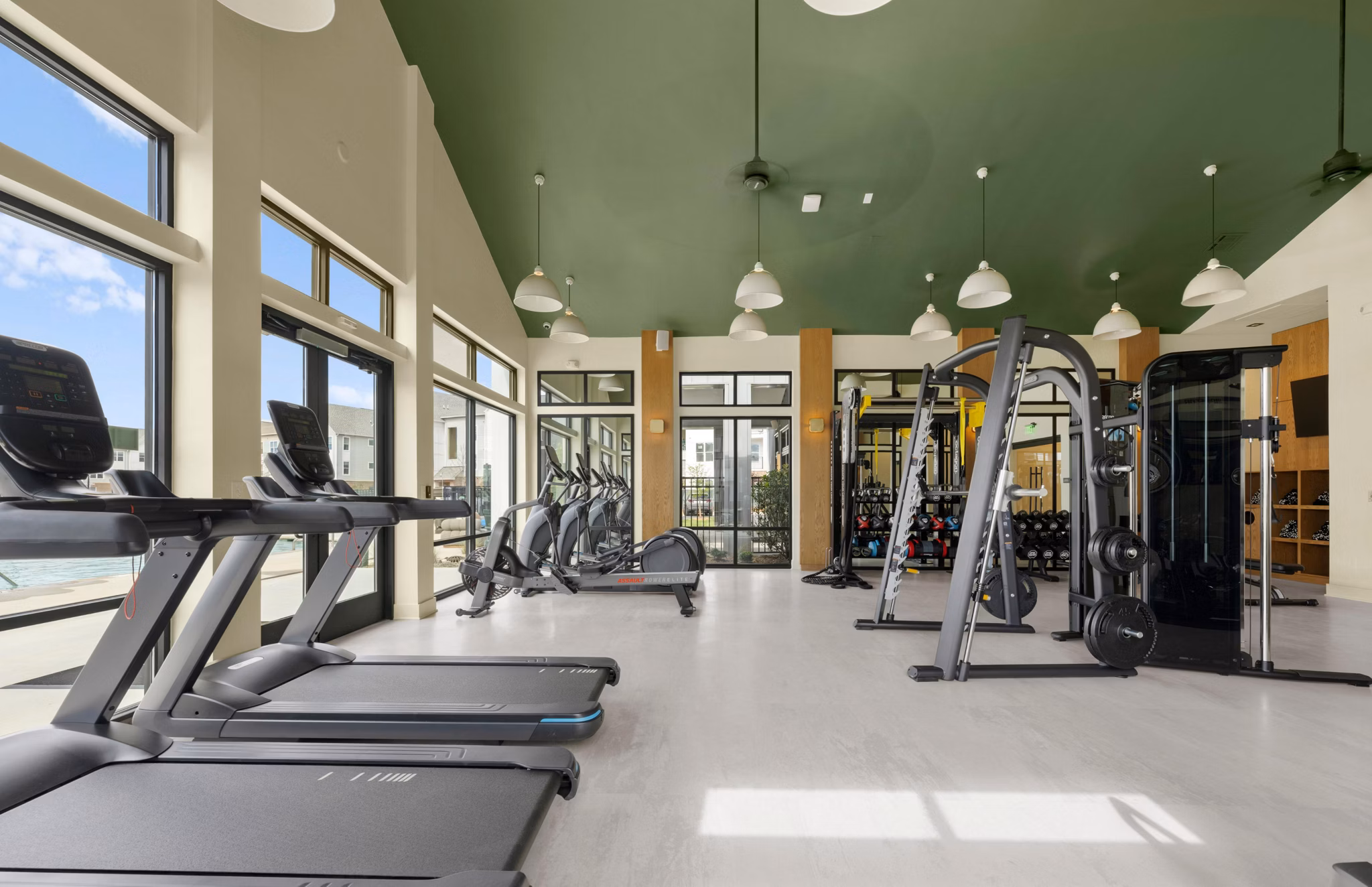Modern fitness center featuring state-of-the-art equipment at Elan Prosperity Village Apartments luxury living