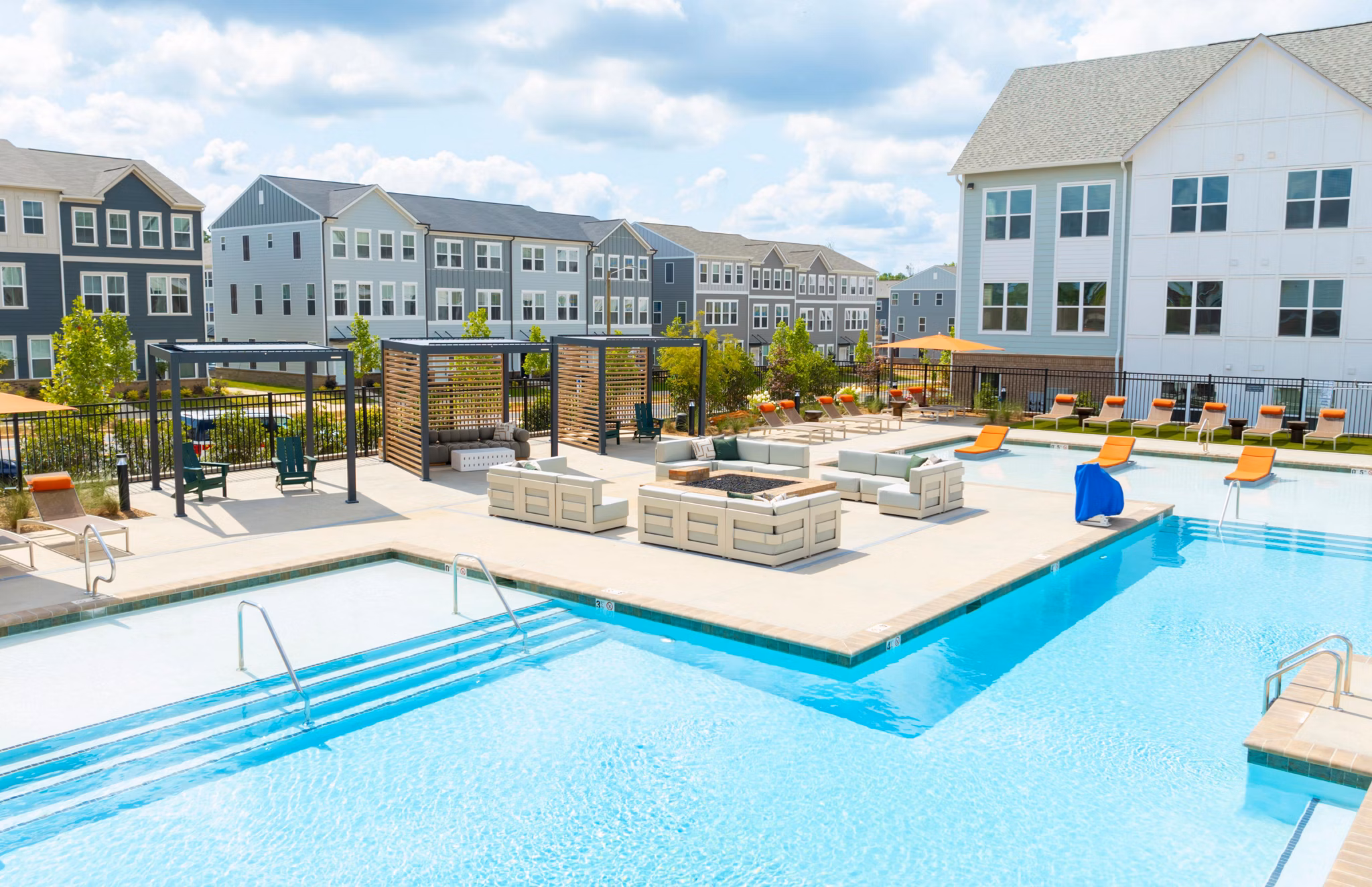 Modern outdoor pool at Elan Prosperity Village Apartments offering relaxation and leisure for residents
