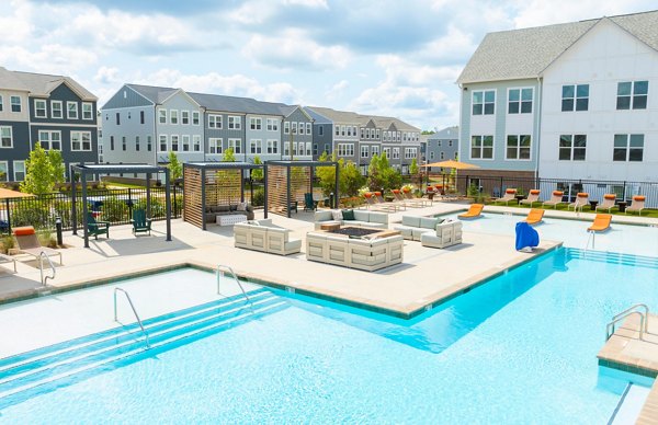 Modern outdoor pool at Elan Prosperity Village Apartments offering relaxation and leisure for residents