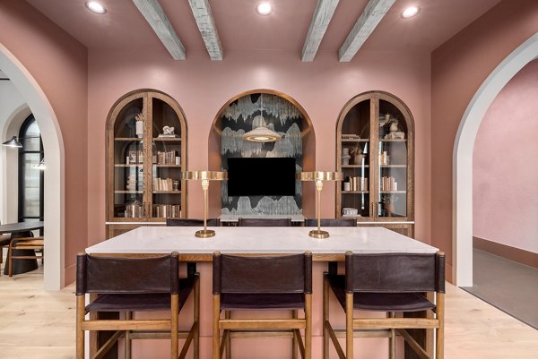 Modern clubhouse meeting facility with sleek design at Asher Apartments, ideal for hosting events and gatherings