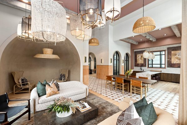Asher Apartments: Modern clubhouse with stylish seating and entertainment areas