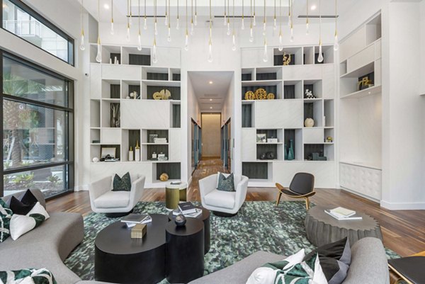 Clubhouse featuring modern design and plush seating at The MAV Apartments, a luxury property offering exceptional living experiences
