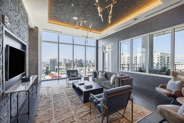 The MAV Apartments: Contemporary clubhouse with stylish seating and entertainment options