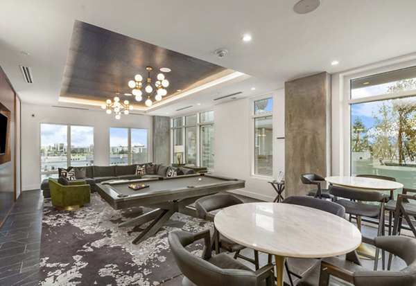 Clubhouse featuring modern design and social spaces at The MAV Apartments