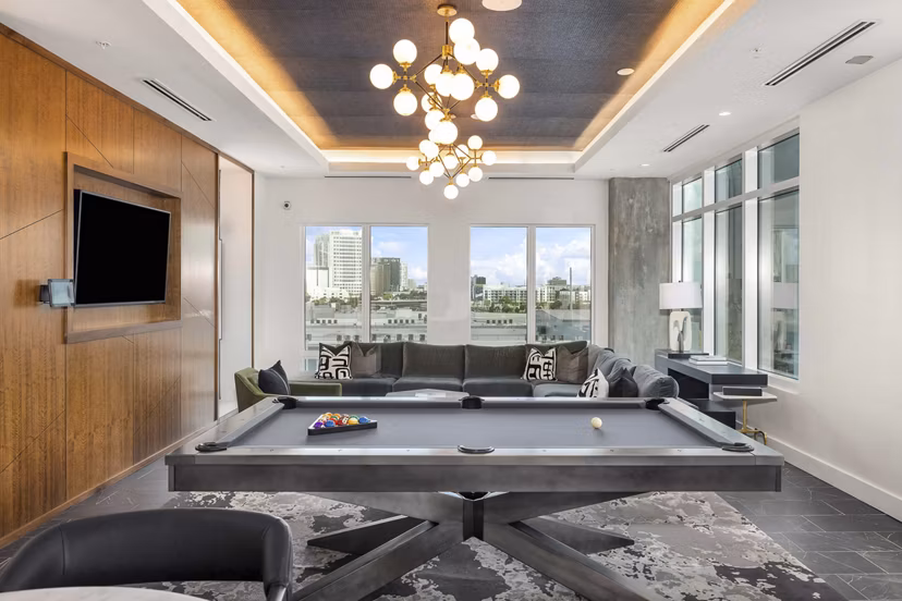 Clubhouse featuring modern design and social spaces at The MAV Apartments, a Greystar luxury property