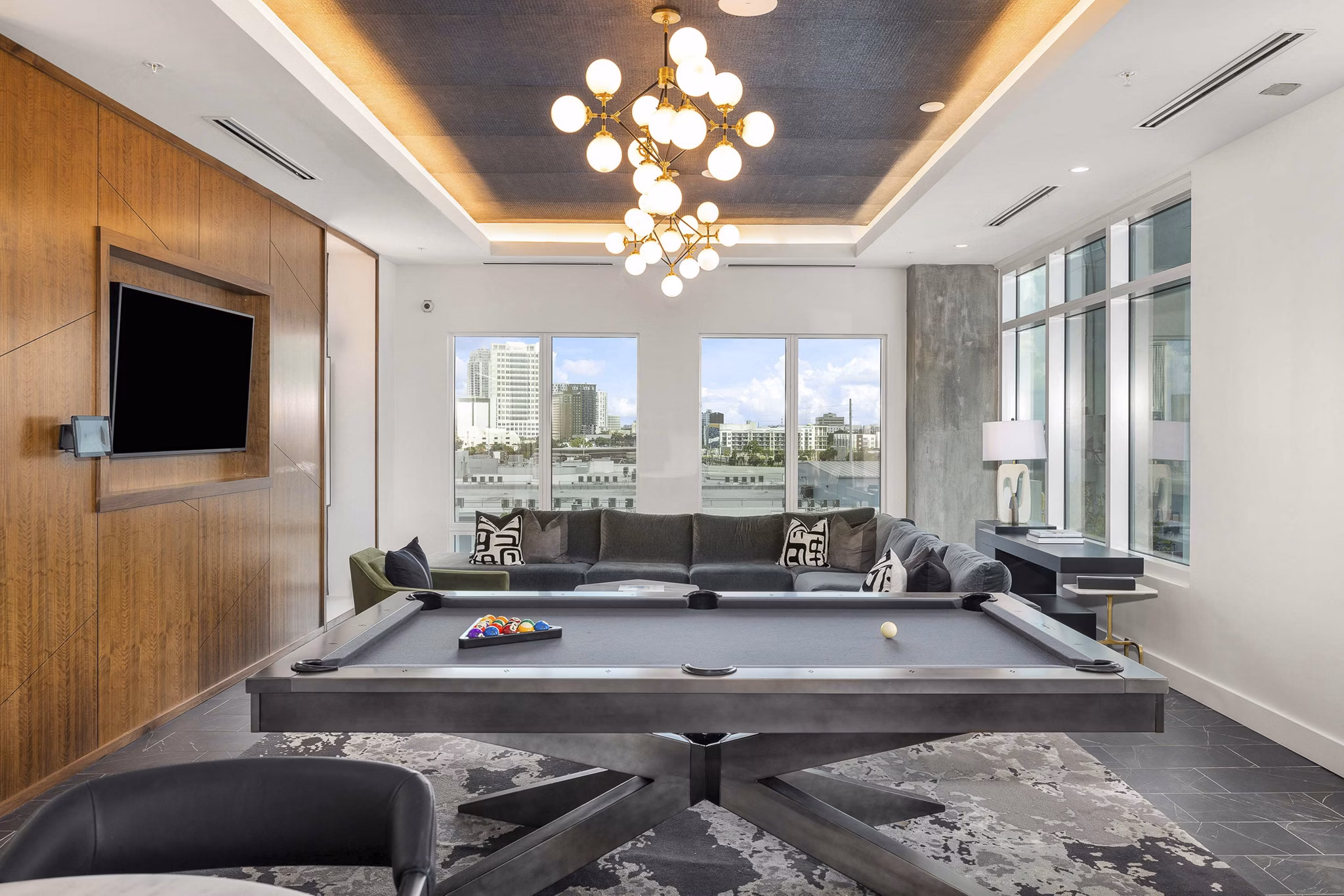 Clubhouse featuring modern design and social spaces at The MAV Apartments, a Greystar luxury property