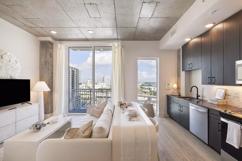 Modern kitchen with stainless steel appliances at The MAV Apartments