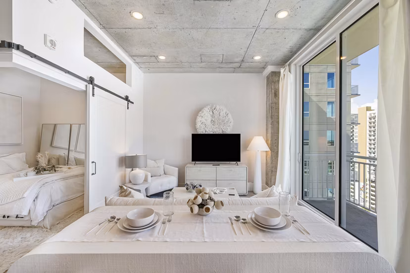 Spacious modern kitchen with stainless steel appliances in The MAV Apartments