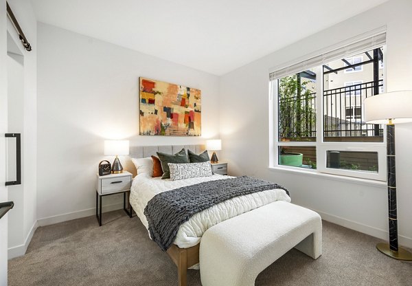Spacious bedroom with modern furnishings at Anthem Everett Apartments