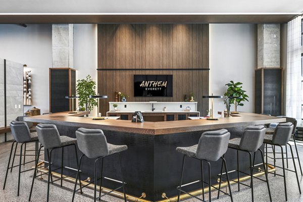 Clubhouse featuring modern design and lounge area at Anthem Everett Apartments in Everett