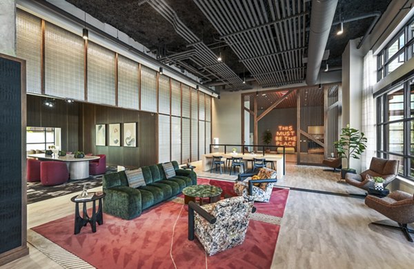 Contemporary clubhouse interior with modern furnishings at Anthem Everett Apartments