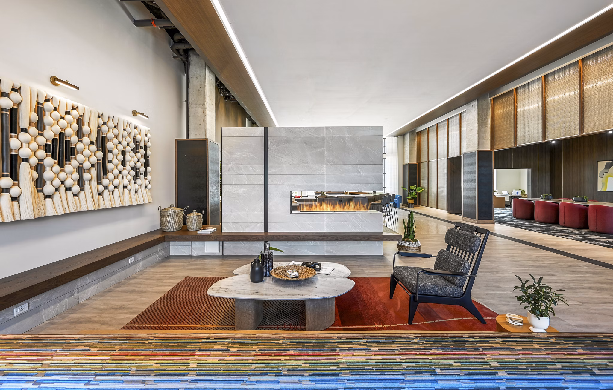 Stylish clubhouse with modern decor and seating at Anthem Everett Apartments, offering luxury living spaces and community areas