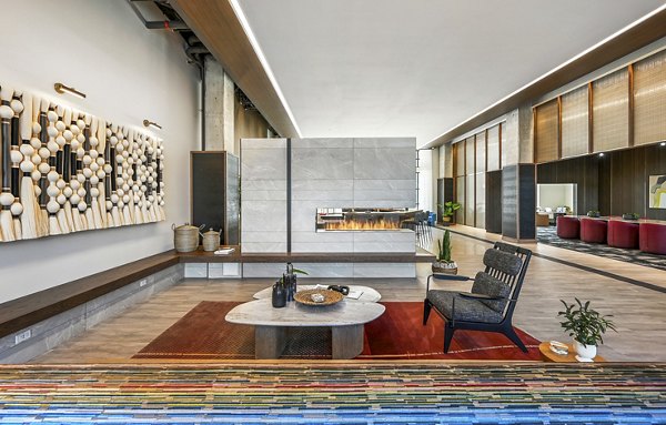 Stylish clubhouse with modern decor and seating at Anthem Everett Apartments, offering luxury living spaces and community areas