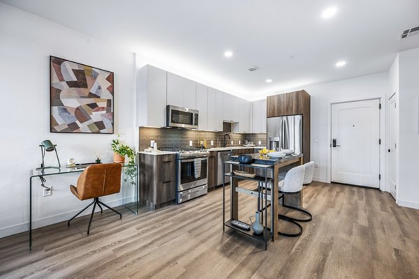 Modern kitchen with stainless steel appliances at Anthem Everett Apartments