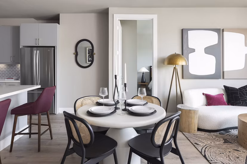 Modern dining area featuring sleek furnishings at Broadstone North Lamar Apartments