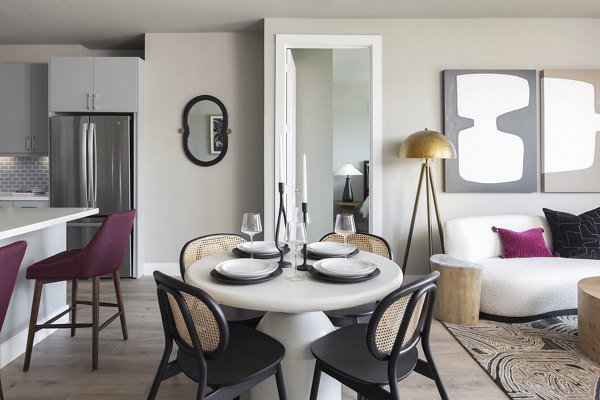 Modern dining area featuring sleek furnishings at Broadstone North Lamar Apartments