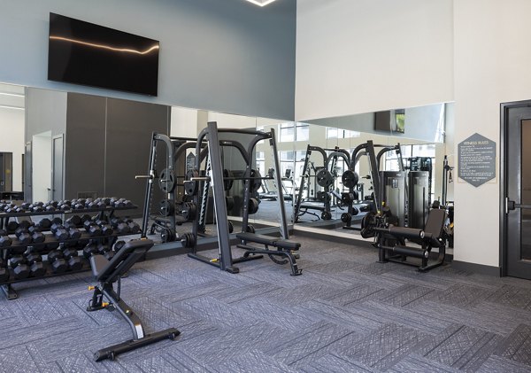 Modern fitness center with state-of-the-art equipment at Broadstone North Lamar Apartments