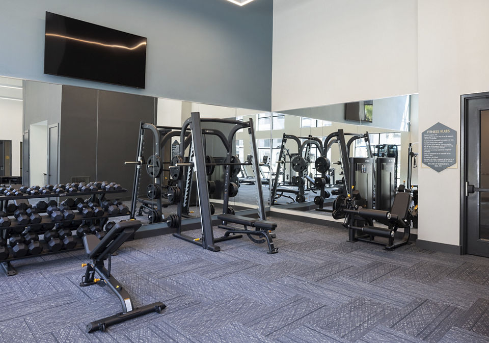 Modern fitness center with state-of-the-art equipment at Broadstone North Lamar Apartments
