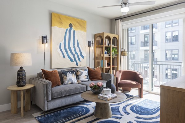 Spacious living room with modern furnishings at Broadstone North Lamar Apartments