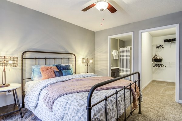 Cozy bedroom with elegant decor at Signature at Sugarloaf Apartments