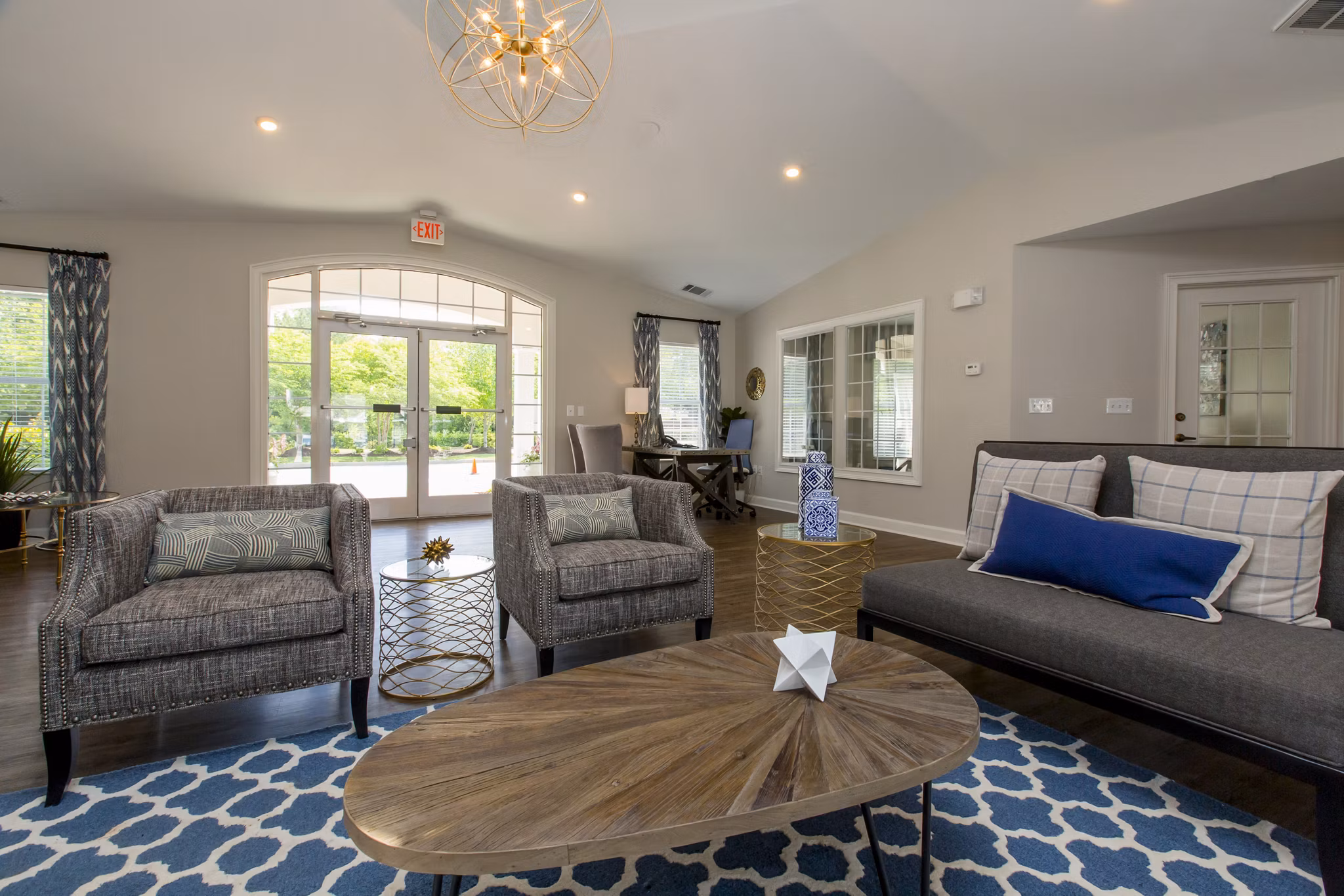 Clubhouse featuring elegant design and modern amenities at Signature at Sugarloaf Apartments