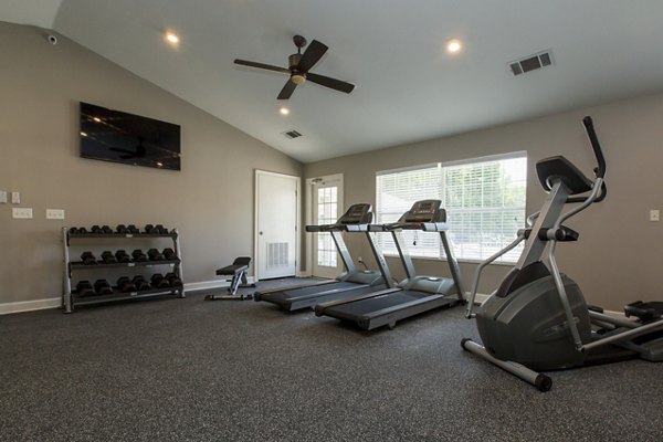 Fitness center with modern equipment at Signature at Sugarloaf Apartments