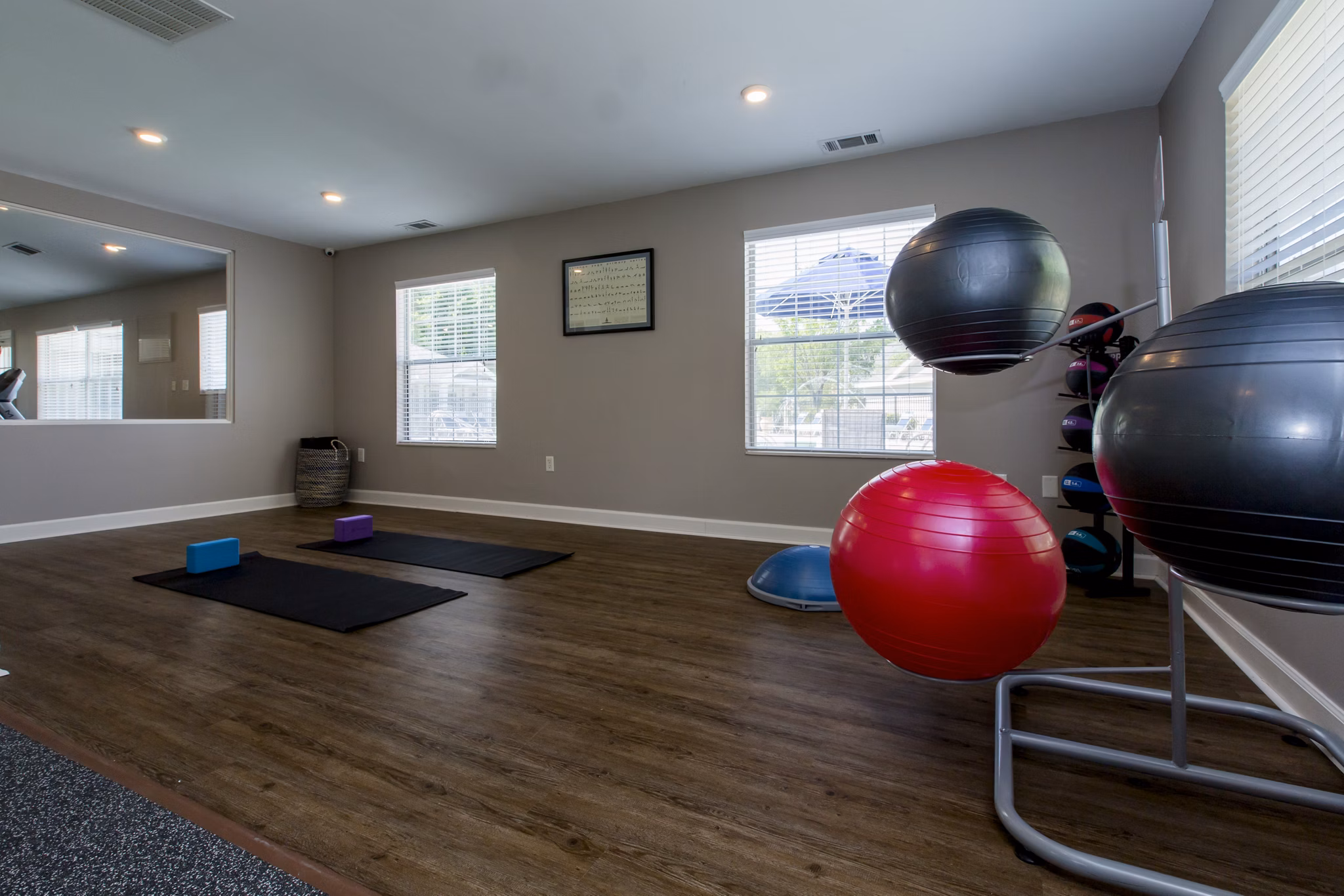 Modern fitness center with state-of-the-art equipment at Signature at Sugarloaf Apartments