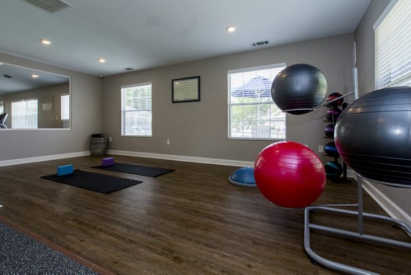 Modern fitness center with state-of-the-art equipment at Signature at Sugarloaf Apartments