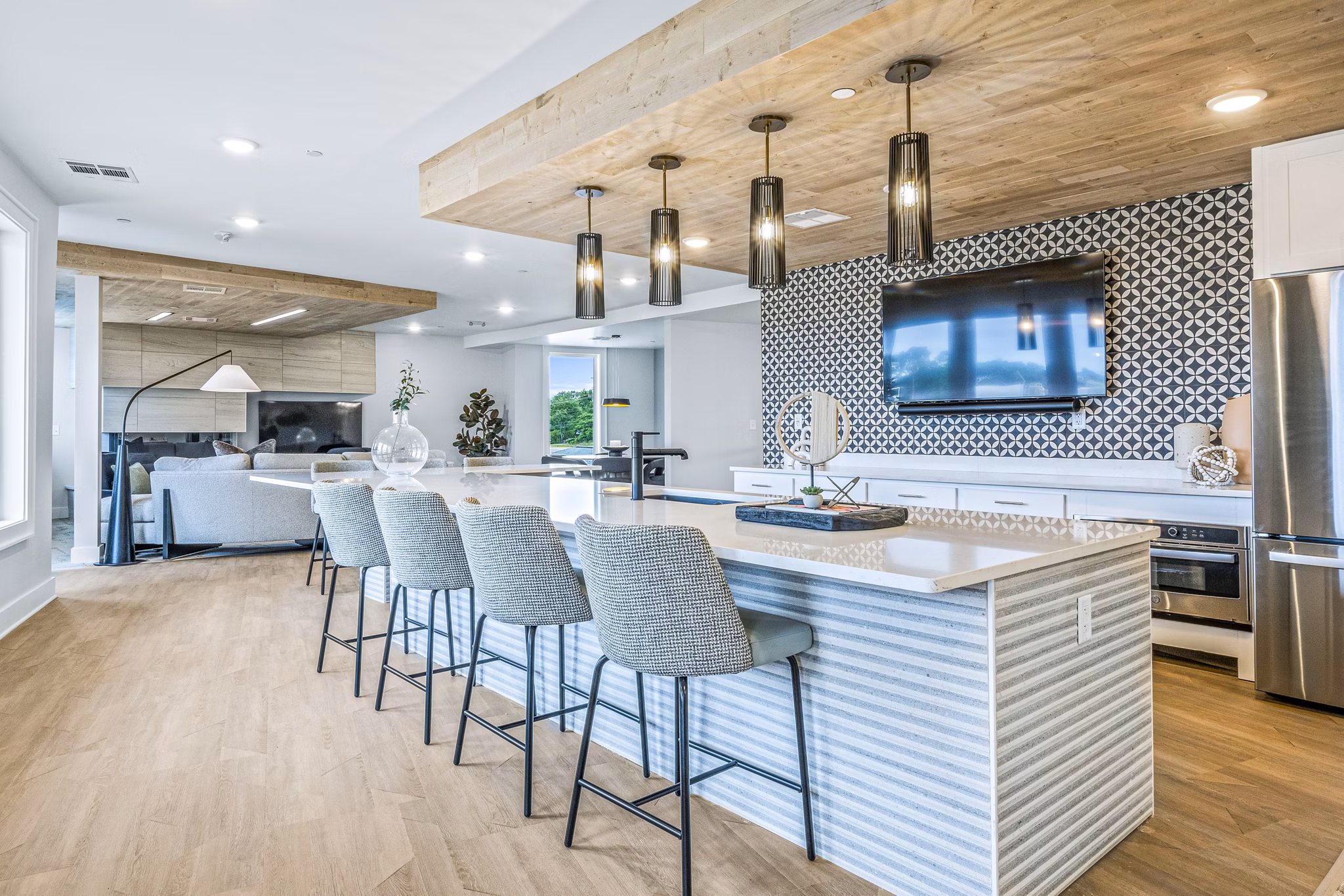 Clubhouse featuring modern design elements at Attain at Bradford Creek Apartments, a luxury Greystar community
