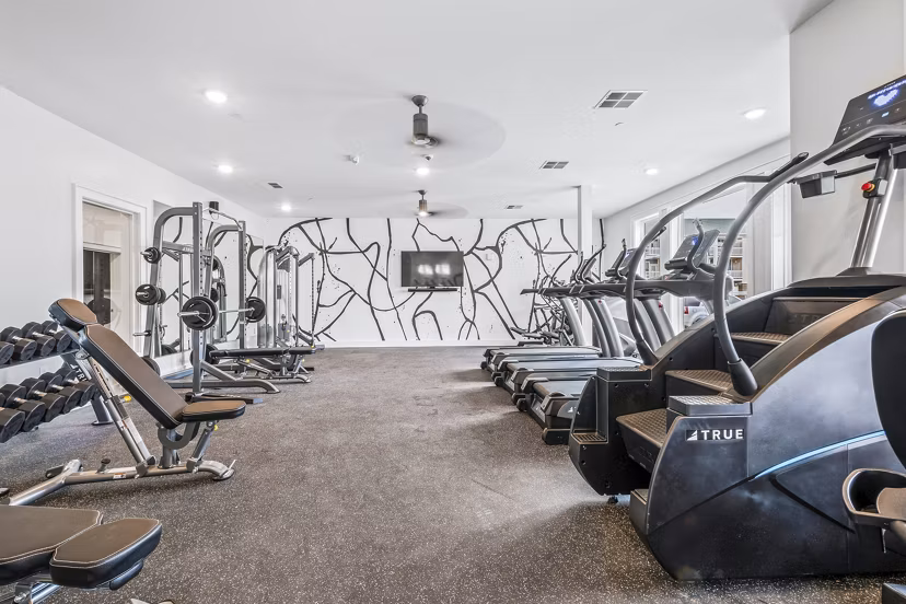 State-of-the-art fitness center with modern equipment at Attain at Bradford Creek Apartments
