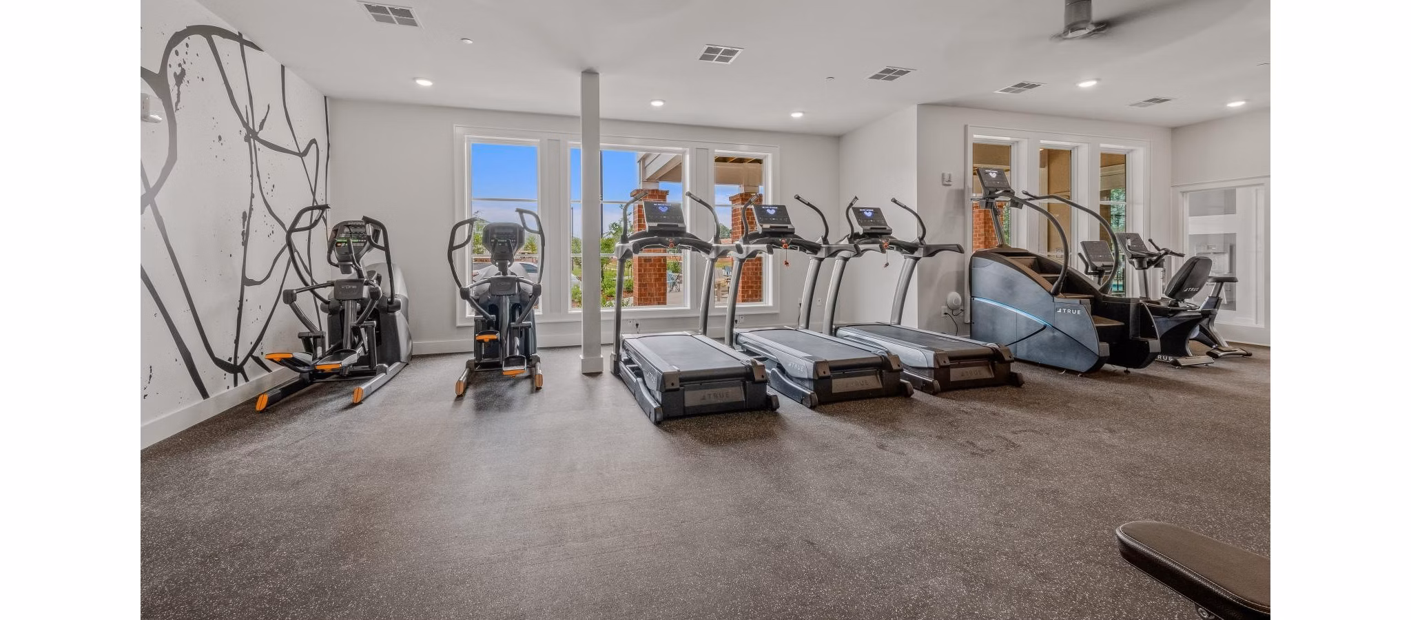 fitness center at Attain at Bradford Creek Apartments 