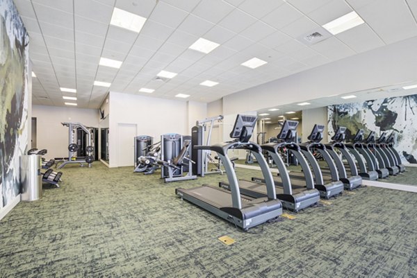 Modern fitness center with state-of-the-art equipment at Parq 170 Apartments