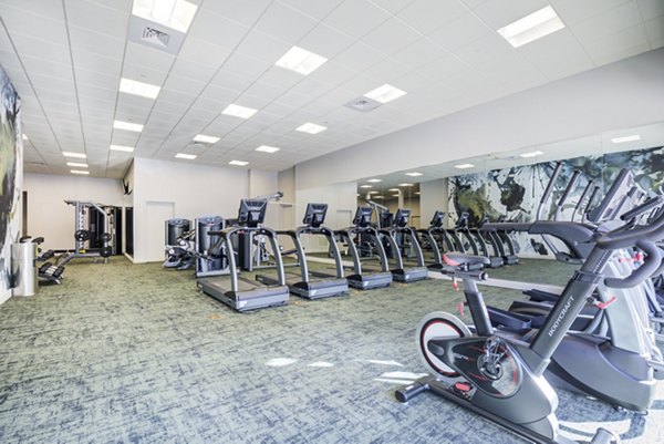 State-of-the-art fitness center at Parq 170 Apartments, featuring modern equipment and spacious workout areas for luxury living