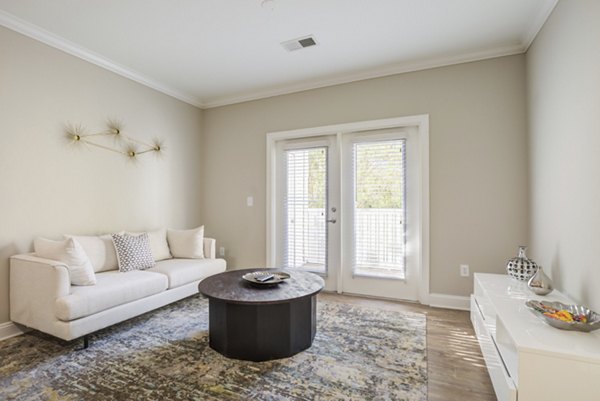 Spacious living room featuring modern furnishings at Parq 170 Apartments