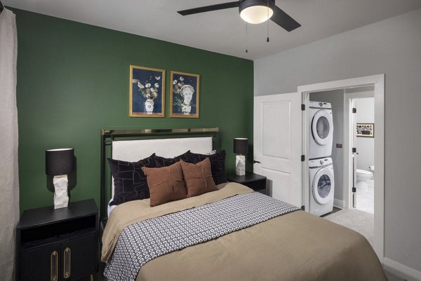 Spacious bedroom with modern furnishings at The Boulevard, a Broadstone Community Apartments