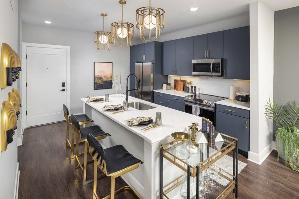 Modern kitchen with stainless steel appliances in The Boulevard, a Broadstone Community Apartments