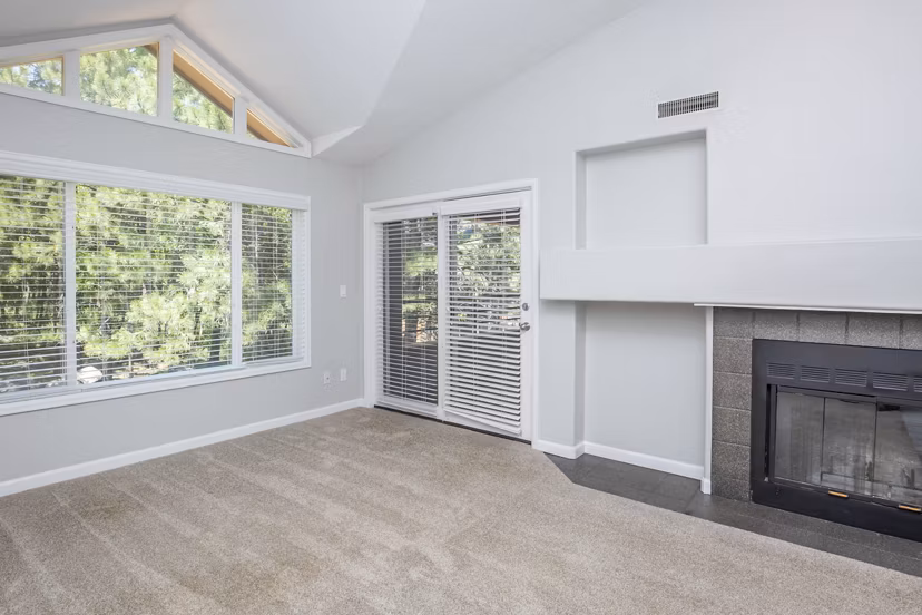 living room at Pines at Broadmoor Bluffs Apartments