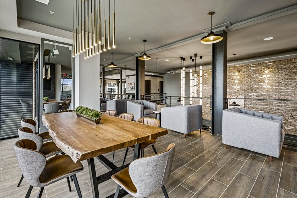 Clubhouse with elegant furnishings and modern decor at The Terra Apartment Homes, offering luxury living and community spaces
