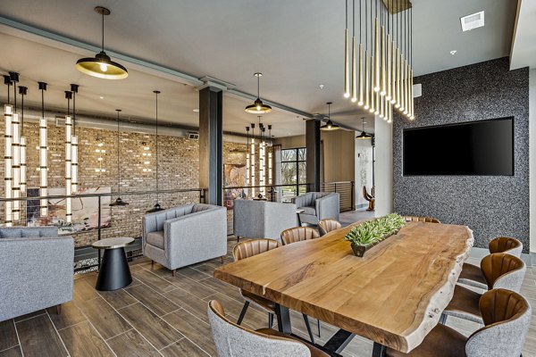 Modern clubhouse with stylish seating and game areas at The Terra Apartment Homes Ideal for social gatherings and relaxation