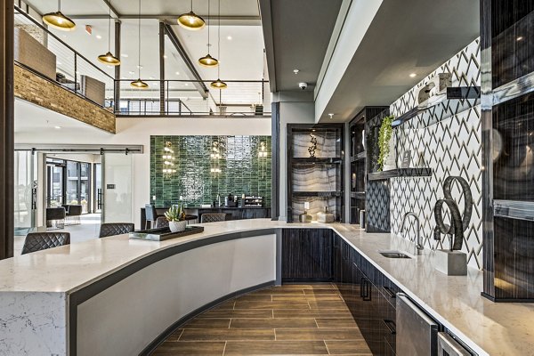 Modern clubhouse with plush seating and fireplace at The Terra Apartment Homes offering luxury amenities and gathering spaces