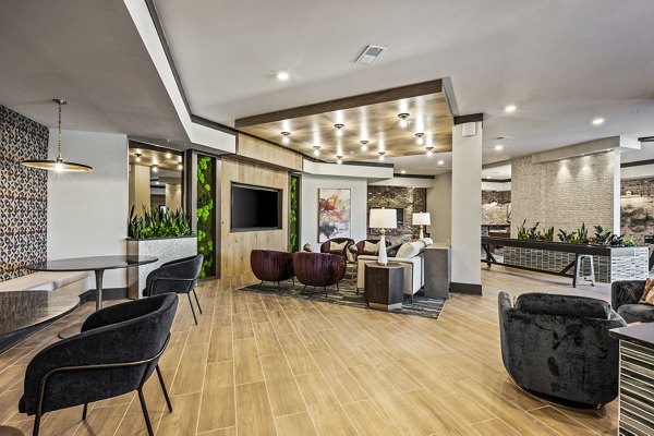 Clubhouse with modern design and spacious seating at The Terra Apartment Homes