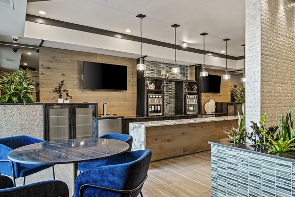 Modern clubhouse with luxury furnishings at The Terra Apartment Homes, perfect for resident gatherings and events