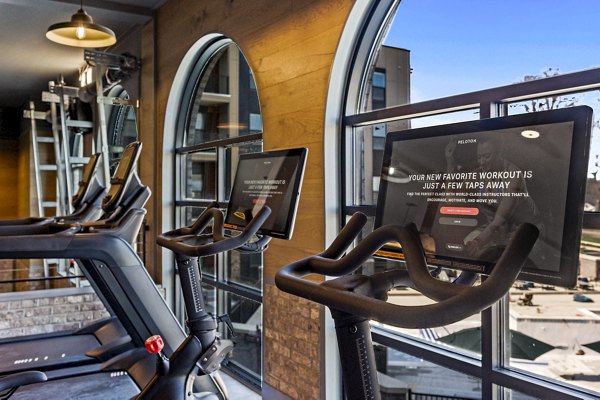 Modern fitness center with state-of-the-art equipment at The Terra Apartment Homes, ideal for active lifestyles and wellness-focused living