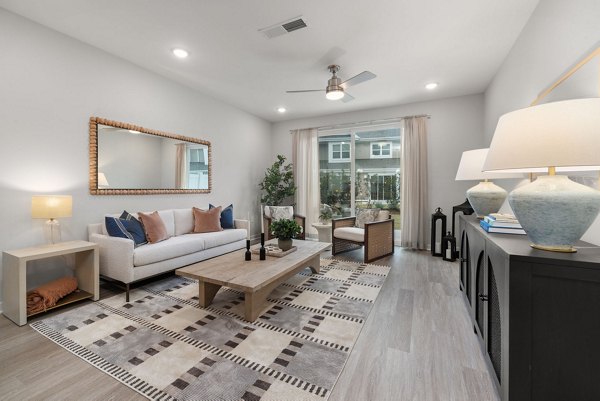 living room at The Village at Compass Pointe Apartments