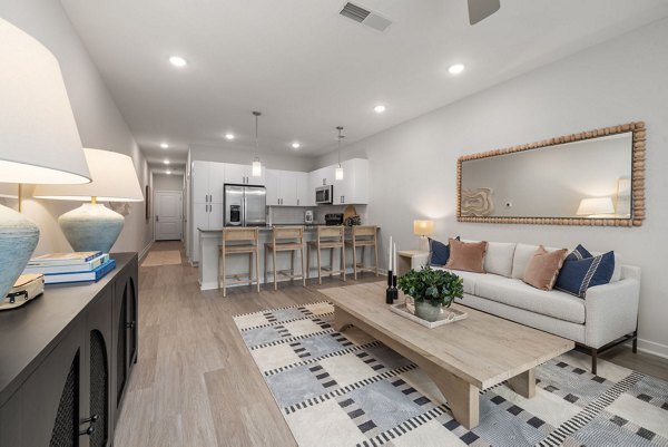 living room at The Village at Compass Pointe Apartments