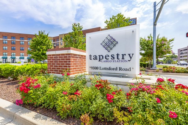 Illuminated signage at Tapestry Largo Station Apartments